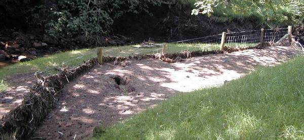 photo of silt against fence